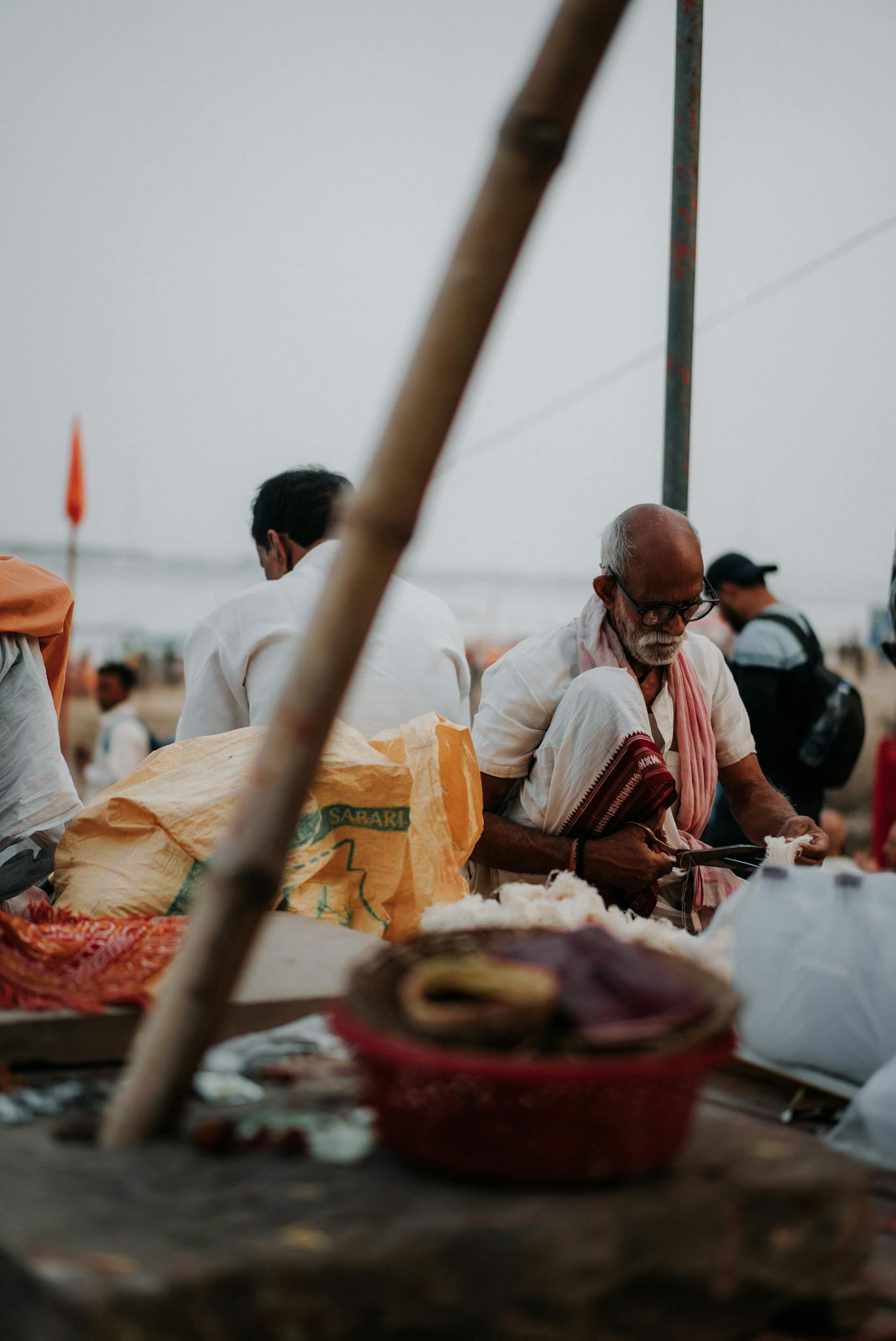Local vendors engaging in trade at an outdoor market, capturing vibrant cultural traditions.
